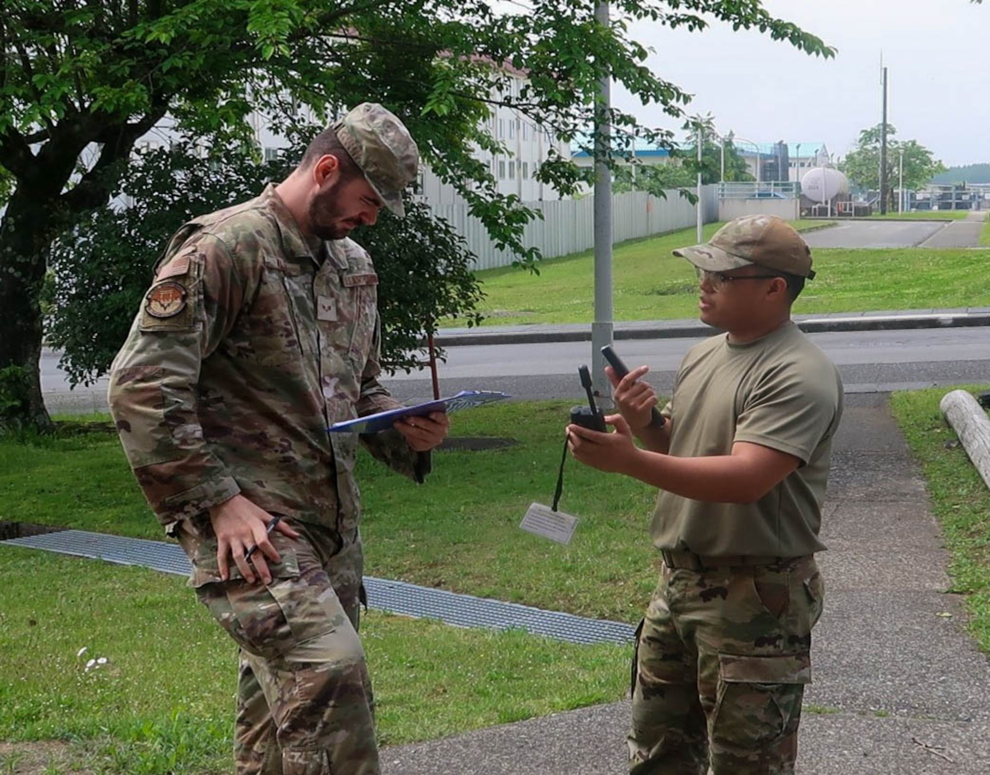 Airmen speak to each other.