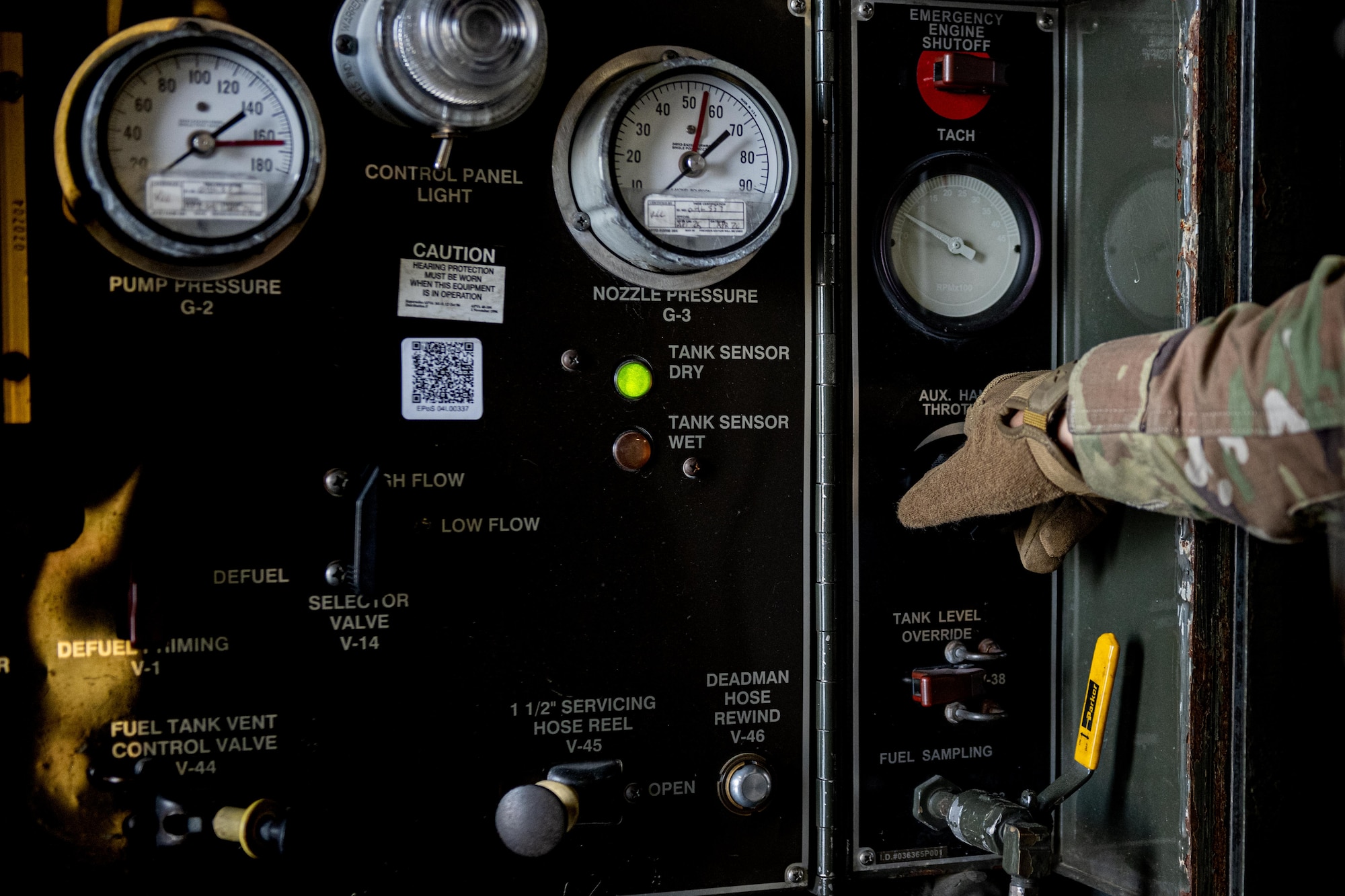 U.S. Air Force Senior Airman Jose Pro, 35th Logistic Readiness Squadron fuels distribution operator, checks the pressure gauge of an R-11 fueling truck during an F-16 Fighting Falcon fuel run at Misawa Air Base, June 10, 2025.