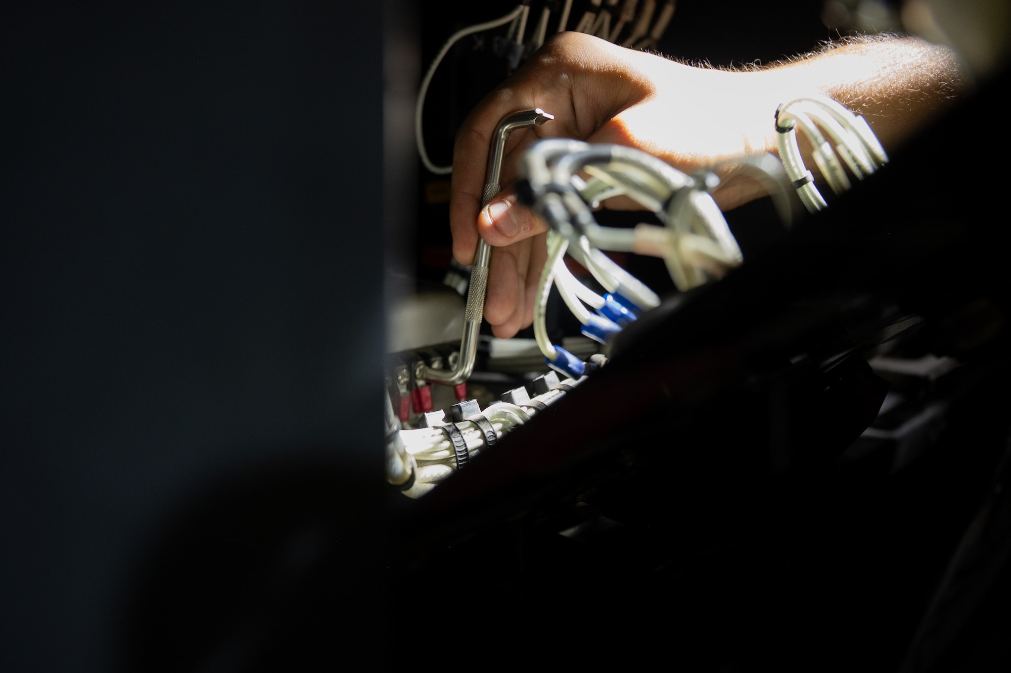 Airman replaces an underfrequency relay