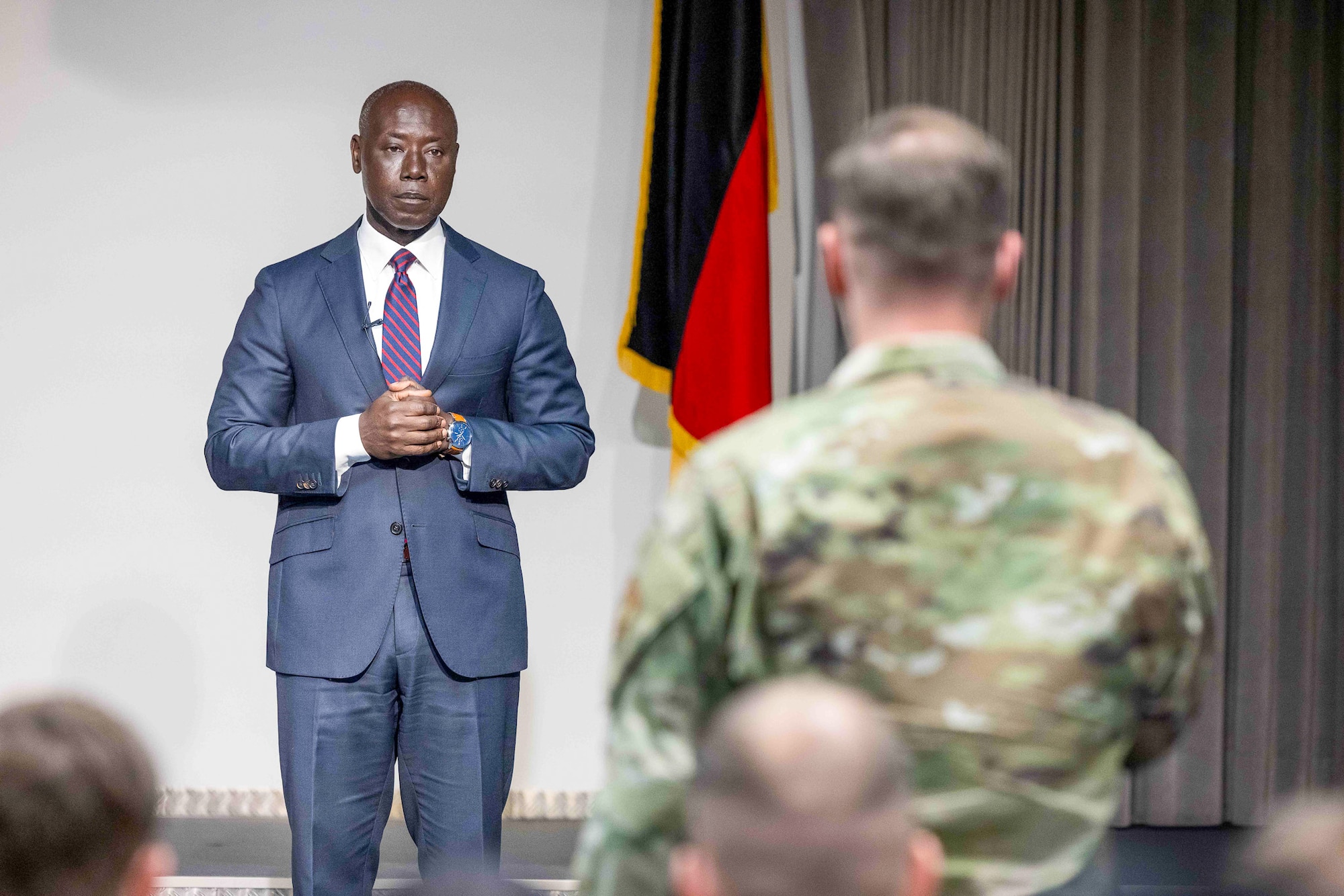 Retired U.S. Air Force Col. Stephen Hughes addresses the U.S. Inter-European Air Forces Academy Class 25B at Kisling Auditorium, Kapaun Air Station, Germany, May 19, 2025. Hughes, one of IEAFA’s original architects, challenged students to carry forward the mission of alliance integration, emphasizing that readiness is not built in crisis, it is built in classrooms like this one. (Photo by Terrance Rhodes, IEAFA Strategic Communications Analyst)