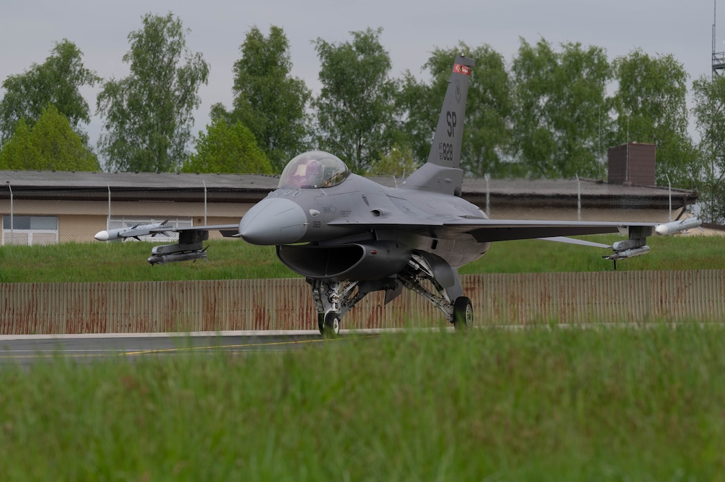 A fighter aircraft waits to taxi on the flightline.