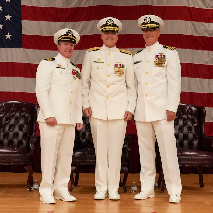 250609-O-NJ594-1018, Portsmouth, Virginia, (June 6, 2025) Capt. Marion Gregg, the outgoing commander of Navy Marine Corps Force Health Protection Command (NMCFHPC), former director of Defense Centers for Public Health Portsmouth (DCPH-P), Capt. Darryl P. Arfsten, the commander of NMCFHPC, director of DCPH-P, and Rear Adm. Kevin Brown, commander of Naval Medical Forces Atlantic, pose for a photo during a change of command ceremony held on board Hampton Roads - Portsmouth Annex, Portsmouth, Virginia, June 6, 2025. A change of command is a time-honored military tradition that signifies the formal transfer of authority, responsibility, and accountability from one leader to another. (U.S. Navy photo by Desmond Martin)
