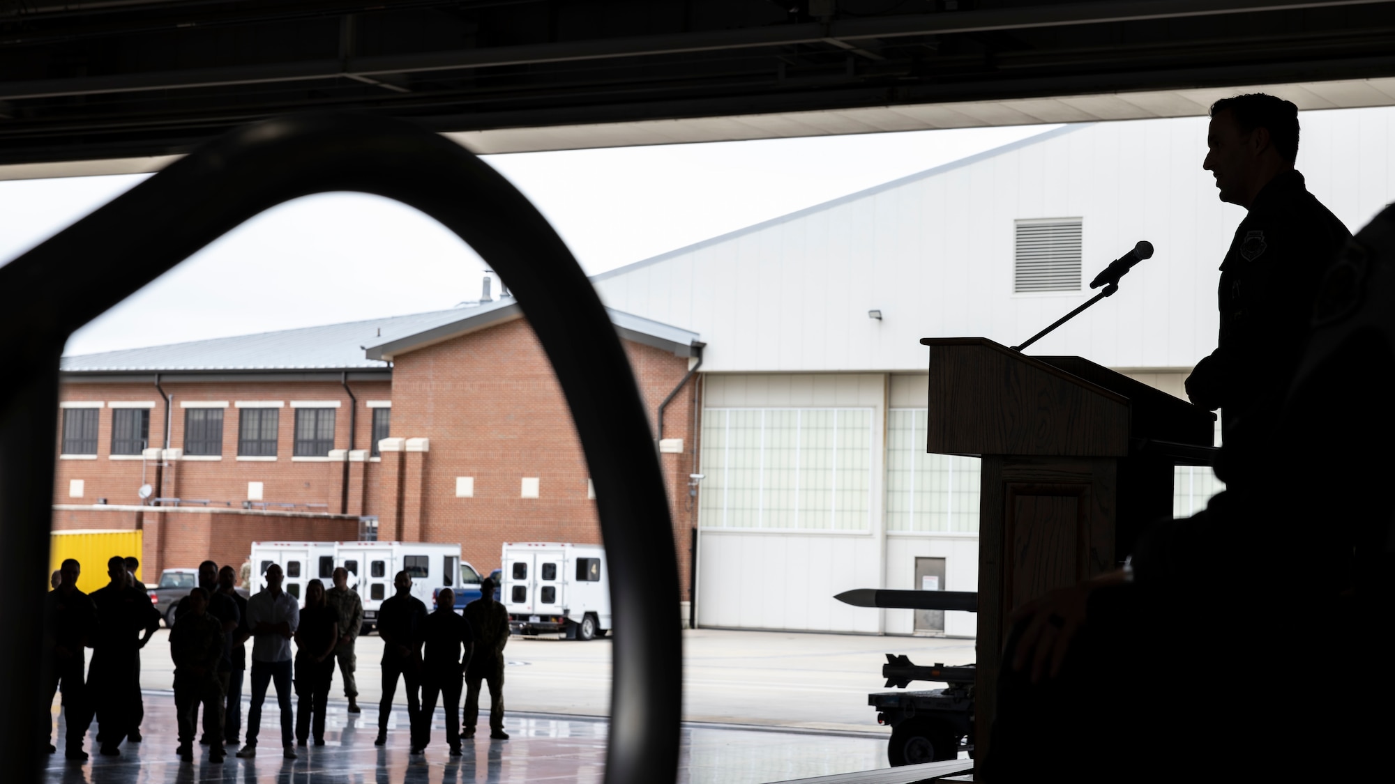 U.S. Air Force Col. Brad Huebinger, incoming 1st Fighter Wing commander, delivers a speech during a change of command ceremony at the 71st Fighter Squadron, Langley Air Force Base, June 6, 2025.  In his new position, Huebinger will lead half the Air Force’s F-22 Raptor inventory, a team of more than 2,000 air superiority warfighters and 11 squadrons. (U.S. Air Force Staff Sgt. Lauren Cobin)