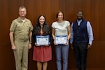 Naval Surface Warfare Center, Philadelphia Division (NSWCPD) honored employees during its Fiscal Year (FY) 2025 Third Quarter Awards Ceremony on June 3, 2025. NSWCPD’s Digital Transformation Team was awarded with a 2024 Warfare Centers Award in Innovation. Accepting the award (from left to right) were Angela Pena and Diane Fricker with NSWCPD Commanding Officer Capt. Joseph Darcy on far left and NSWCPD Technical Director Nigel C. Thijs, SES on far right. (U.S. Navy photo by Jay Butterbaugh/Released)