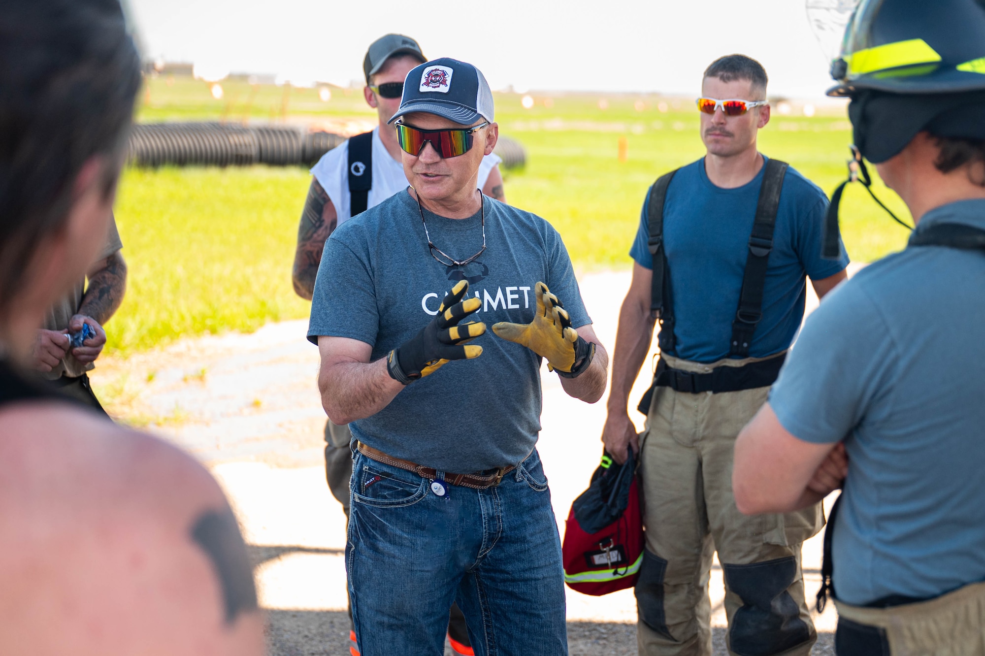 Man talking to a group around him