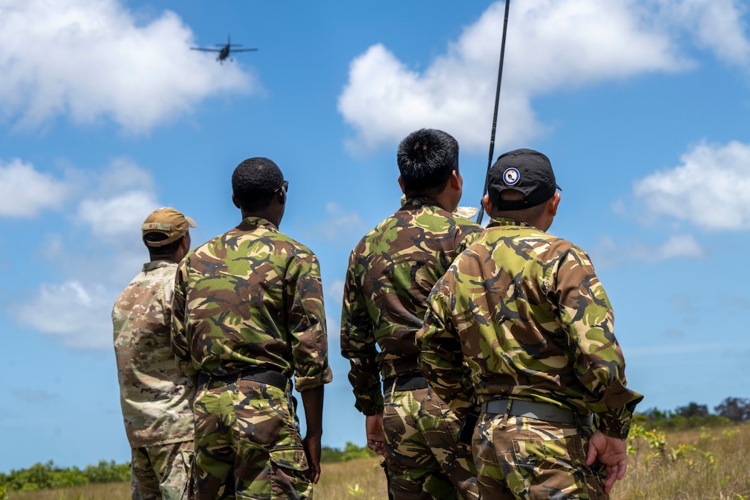 Airmen watch aircraft