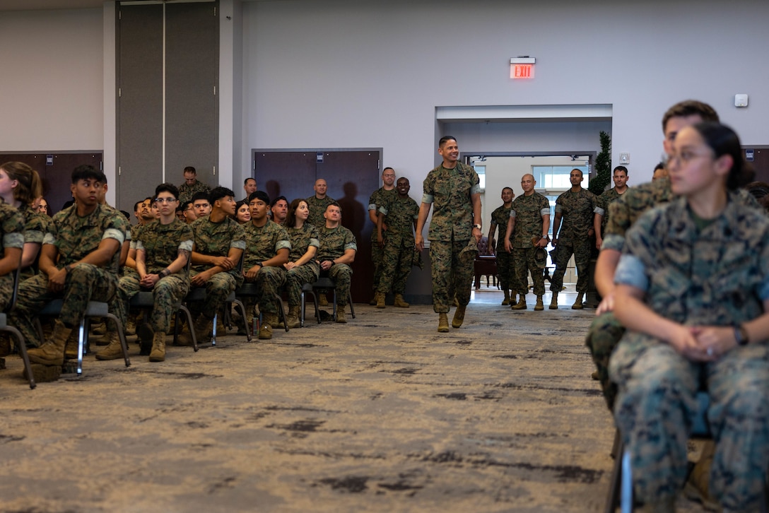 U.S. Marine Corps Sgt. Maj. Carlos A. Ruiz, the 20th sergeant major of the Marine Corps, walks into Millers Landing to conduct a town hall with Marines at Marine Corps Air Station Cherry Point, North Carolina, June 6, 2025.