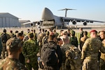 Partner nation military leaders observe as 433rd Airlift Wing Citizen Airmen open the front visor of a C-5M Super Galaxy during an aircraft tour and familiarization as part of Exercise Southern Star ‘25 at Arturo Merino Benitez International Airport in Santiago, Chile, June 7, 2025. Southern Star ‘25 is a multinational special operations exercise taking place across Chile from May 26 to June 8, uniting forces from six nations and 10 observing countries, totaling more than 2,700 participants to enhance interoperability and strengthen global SOF partnerships through joint training from as far north as Antofagasta to the southern region of Punta Arenas. (U.S. Air Force photo by Julian Hernandez)
