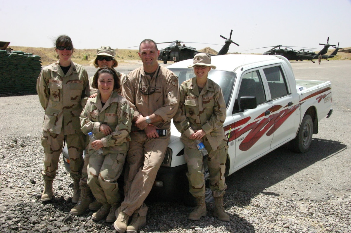 Image of Airmen posing for a photo.