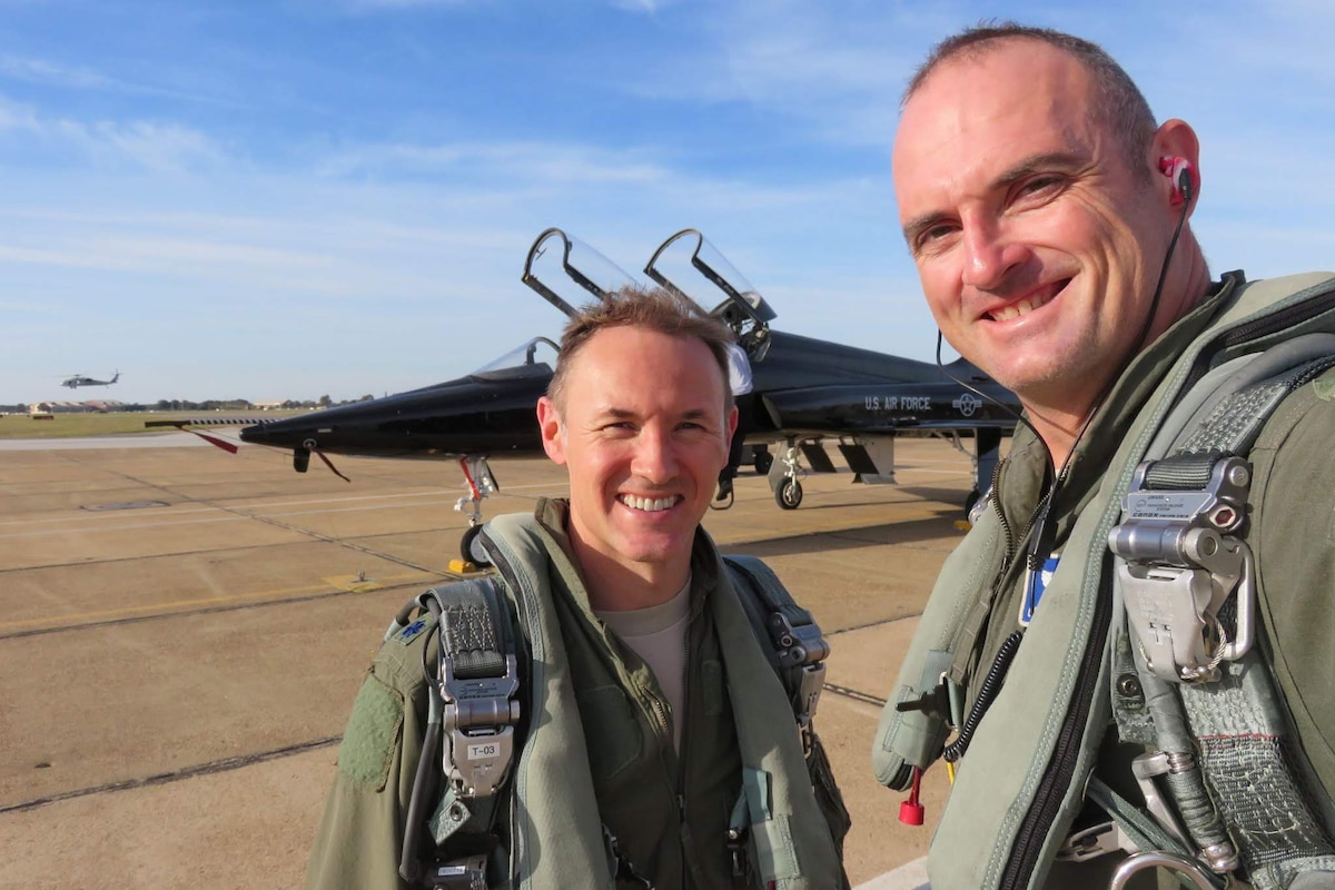 Image of Airmen posing for a photo.