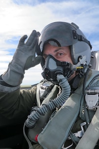 Image of Airmen posing for a photo.