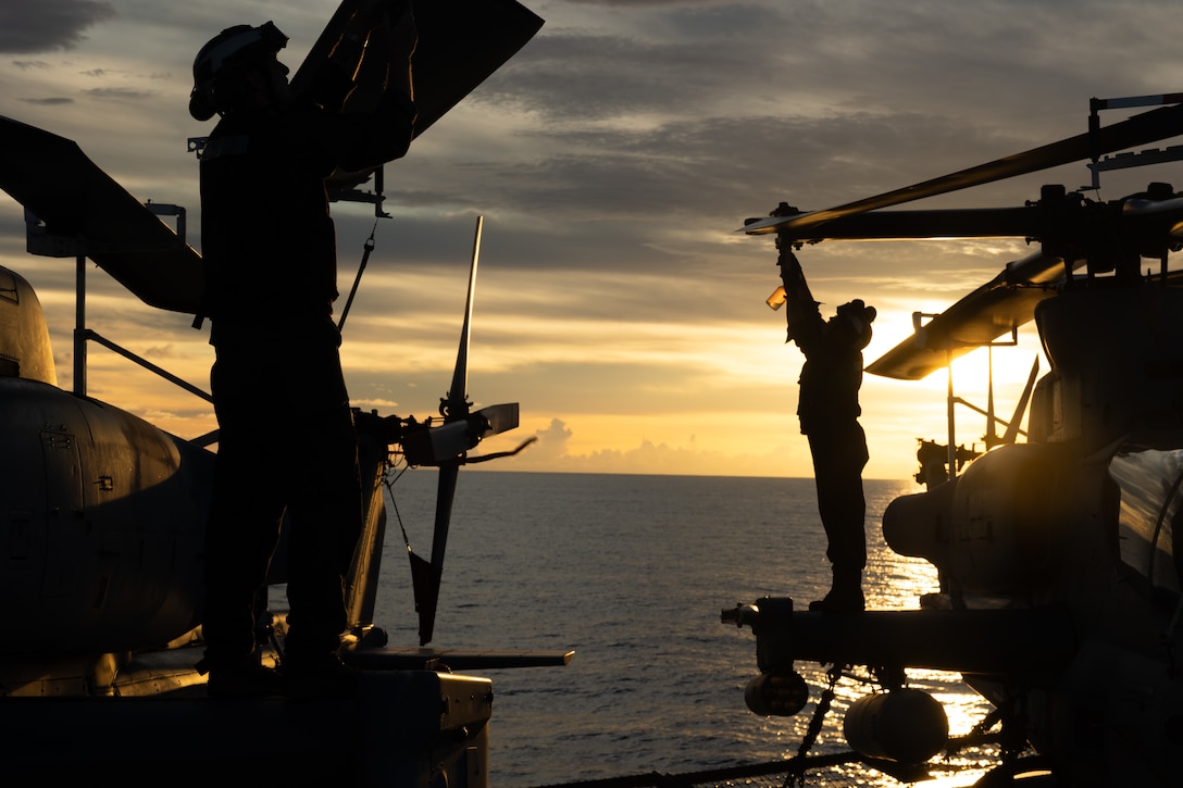 U.S. Marines with Marine Medium Tiltrotor Squadron (VMM) 265 (Rein.), 31st Marine Expeditionary Unit, conduct maintenance on aircraft during flight operations aboard amphibious transport dock USS San Diego (LPD 22), in the Philippine Sea, June 6, 2025. Marines and Sailors conducted flight operations in order to expand mission capabilities in support of the 31st MEU. The 31st MEU is operating aboard ships of the USS America Amphibious Ready Group in the 7th Fleet area of operations, the U.S. Navy’s largest forward-deployed numbered fleet, and routinely interacts and operates with allies and partners in preserving a free and open Indo-Pacific region.