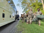 New York Army National Guard Soldiers of the 27th Infantry Brigade Combat Team load their gear onto a bus as they prepare to depart for Washington D.C. on June 11, 2025 at Hancock Air National Guard Base in Syracuse, New York to take part in the Army’s 250th Birthday Parade in Washington, D.C. Four hundred and thirty-six Soldiers from the New York and Massachusetts Army National Guard, assigned to the 42nd Infantry Division, will take part in the parade on June 14. The 42nd Infantry Division is the only Army National Guard unit taking part in the parade.