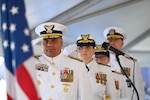 Coast Guard leaders salute the national flag during the Coast Guard Cutter Healy (WAGB-20) change-of-command ceremony in Seattle, June 10, 2025. The 420-foot icebreaker is the Coast Guard’s primary platform for Arctic missions. (U.S. Coast Guard photo by Petty Officer 3rd Class Annika Hirschler)