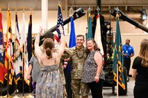 U.S. Army Lt. Col. Stuart Williams, outgoing Army Field Support Battalion-Charleston commander, poses for photos with his family following the AFSBn-CHS change of command ceremony at Joint Base Charleston.