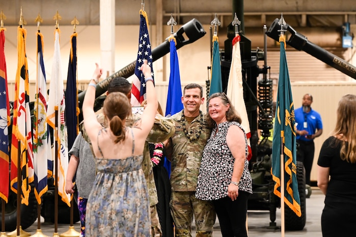 U.S. Army Lt. Col. Stuart Williams, outgoing Army Field Support Battalion-Charleston commander, poses for photos with his family following the AFSBn-CHS change of command ceremony at Joint Base Charleston.