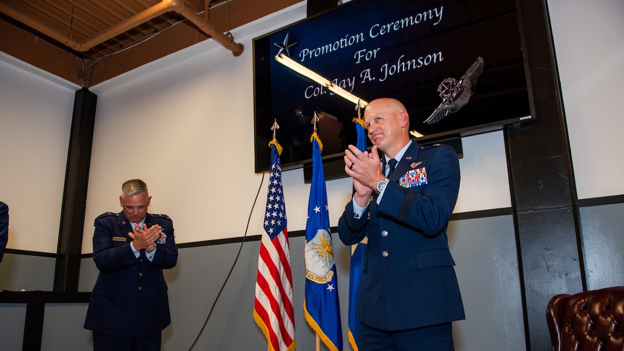 Generals claps after reading of orders
