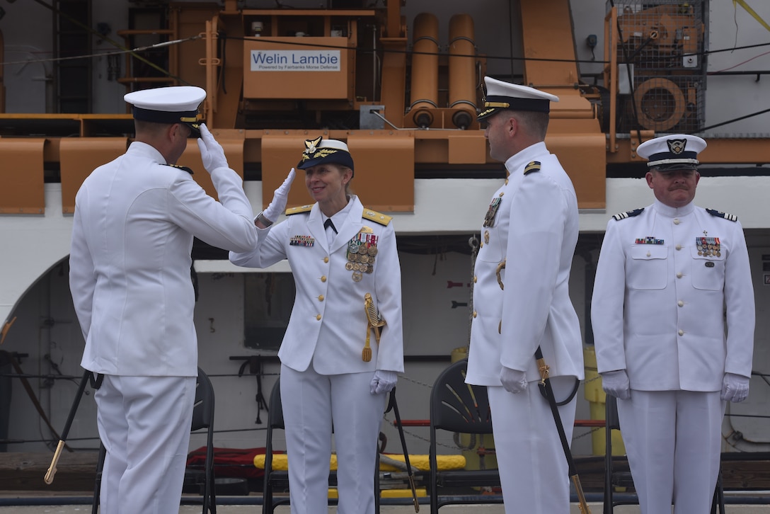 Rear Adm. Joanna Hiigel, deputy commander of U.S. Coast Guard Pacific Area, saluted during the change of command ceremony for U.S. Coast Guard Cutter Active (WMEC 618), Sunday, Jun. 8, in San Diego.  Cmdr. Earl Potter relieved Cmdr. Adam Disque as Active’s commanding officer. Under Disque’s leadership, Active deployed to the Eastern Pacific Ocean in support of counternarcotics efforts, search and rescue and territorial integrity. (U.S. Coast Guard photo by Lt. Karen Hovey)