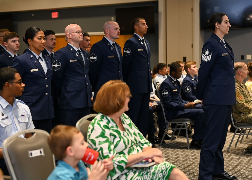 U.S. Space Force Tech. Sgt. Christina Epperson leads 533rd Training Squadron, Detachment 1 Guardians in a four-by-four formation during the 533rd TRS, Detachment 1 Change of Command Ceremony at the Powell Event Center, Goodfellow Air Force Base, Texas, June 10, 2025. The 533rd TRS has three geographically separated units in California, Texas and Mississippi. (U.S. Air Force photo by Senior Airman Evelyn J. D'Errico)