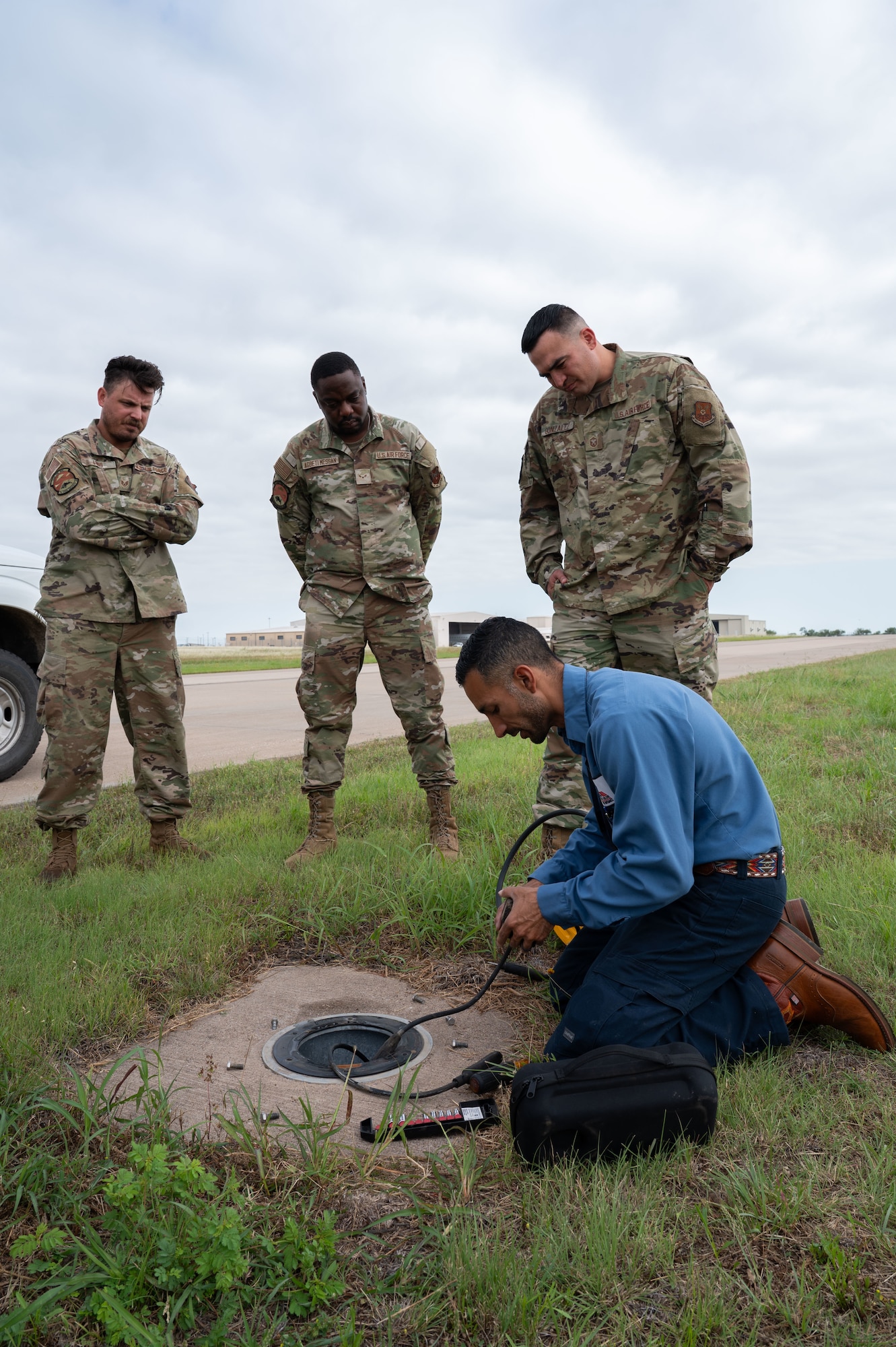 Monty Murillo, Abilene Regional Airport electrical systems superintendent, demonstrates electrical procedures to members of the 7th Civil Engineer Squadron during a knowledge exchange at the Abilene Regional Airport, June 6, 2025.  By observing Abilene Regional Airport's operations, the 7th CES enhances its capabilities, ensuring safe and efficient airfield lighting operations at Dyess Air Force Base. (U.S. Air Force photo by Senior Airman Alondra Cristobal Hernandez)