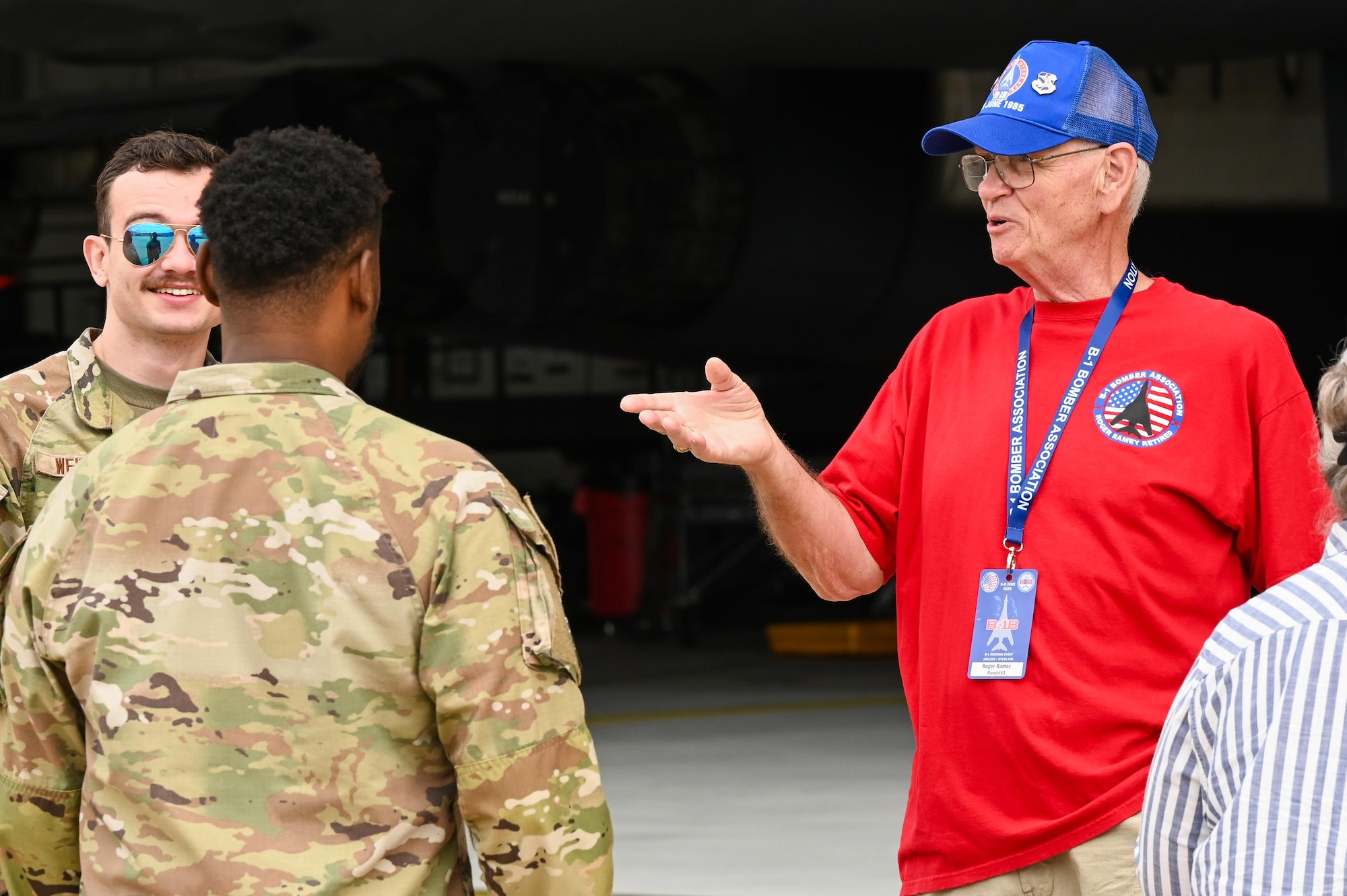 U.S. Air Force Master Sgt. Roger Ramey (Ret.), a retired aerospace ground equipment maintainer, speaks with U.S. Air Force maintainers during the B-1 Reunion at Dyess Air Force Base, Texas, June 6, 2025. The reunion united past and present aircrew and maintainers who contributed to the B-1’s distinguished legacy. (U.S. Air Force photo by Airman 1st Class Adrien Tran)