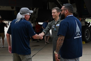 U.S. Air Force Lt. Col. Brian Shanley, 7th Operations Support Squadron commander, shakes the hand of a retired U.S. Air Force Veteran during the B-1 Reunion at Dyess Air Force Base, Texas, June 7, 2025. Dyess AFB hosted a reunion with the B-1 Bomber Association to celebrate 40 years of B-1 operations.   (U.S. Air Force photo by Airman 1st Class Adrien Tran)