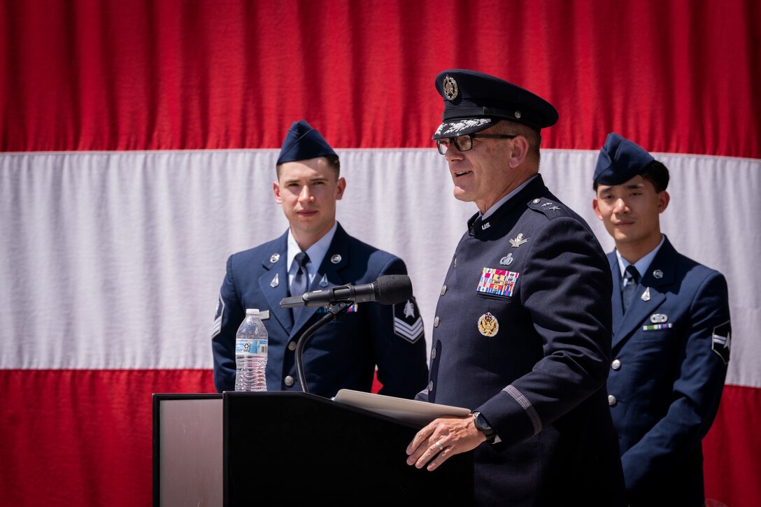 Change of command with flags, Space Fore uniforms and a podium.