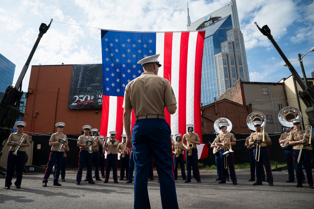 U.S. Marines with the 2nd Marine Aircraft Wing band, Special Purpose Marine Air-Ground Task Force-250, perform at an equipment display during Marine Week Nashville, in Nashville, Tennessee, June 5, 2025. Marines set up multiple equipment displays and recruiting booths during Marine Week to engage with the community of Nashville. Throughout 2025, Marines across the globe will celebrate the 250th birthday of the Corps, commemorating, service, sacrifice, and priding themselves on living ‘Semper Fidelis’ or ‘Always Faithful’ to their nation and to each other. (U.S. Marine Corps photo by Cpl. Vincent Needham)