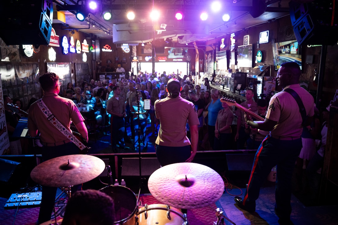 U.S. Marines with the 2nd Marine Aircraft Wing band, Special Purpose Marine Air Ground Task Force-250, perform at Tootsies Orchid Lounge during Marine Week Nashville, in Nashville, Tennessee, June 6, 2025. Tootsies hosted the 2nd MAW band as a way to show support for the Marine Corps. Throughout 2025, Marines across the globe will celebrate the 250th birthday of the Corps, commemorating, service, sacrifice, and priding themselves on living ‘Semper Fidelis’ or ‘Always Faithful’ to their nation and to each other. (U.S. Marine Corps photo by Cpl. Vincent Needham)