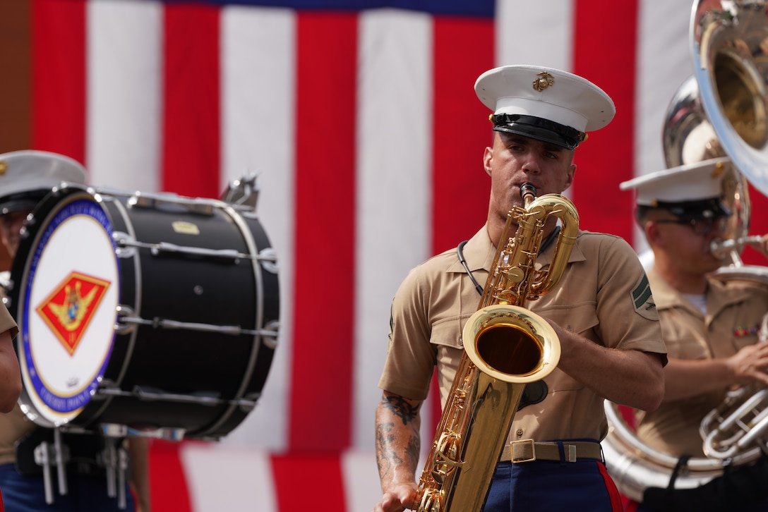 U.S. Marine Corps Cpl. David Zehrung, a saxophone instrumentalist with 2d Marine Aircraft Wing band, Special-Purpose Marine Air-Ground Task Force 250, performs at a Marine Corps static display as part of Marine Week Nashville in Nashville, Tennessee, June 6, 2025. Nashville hosted 2d Marine Aircraft Wing band as a way to show support for the Marine Corps. (Courtesy photo by Gunnery Sgt. Michael Newell)