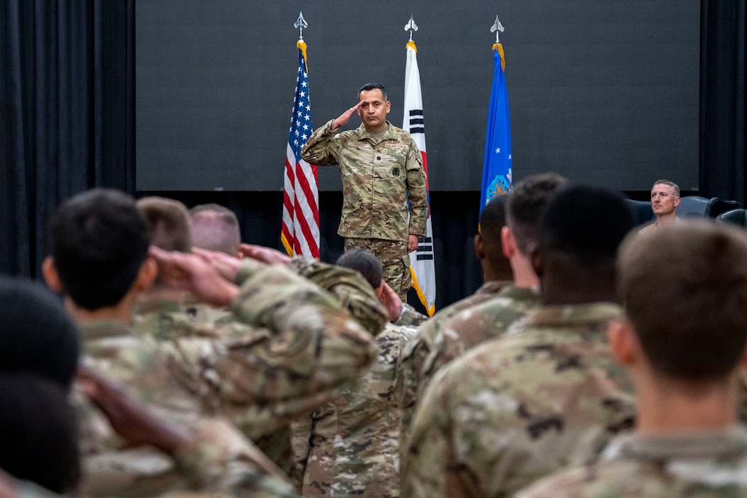 U.S. Air Force Lt. Col. Ryan Tamez, incoming 6th Intelligence Squadron commander, renders his first salute during a Change of Command ceremony at Osan Air Base, Republic of Korea, June 11, 2025.