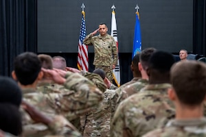 U.S. Air Force Lt. Col. Ryan Tamez, incoming 6th Intelligence Squadron commander, renders his first salute during a Change of Command ceremony at Osan Air Base, Republic of Korea, June 11, 2025.