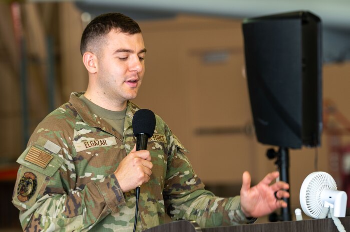 Airman speaks into crowd.