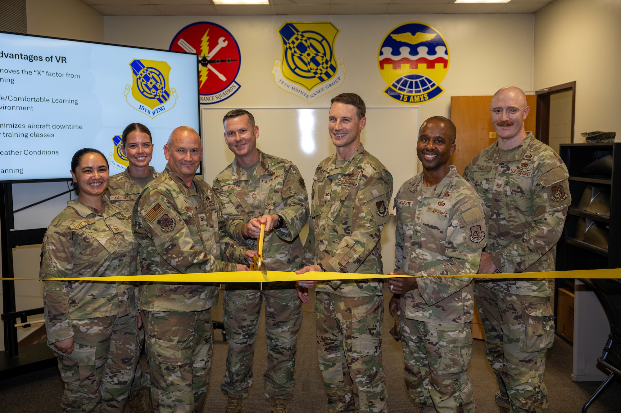 Hickam leadership cutting a ribbon.