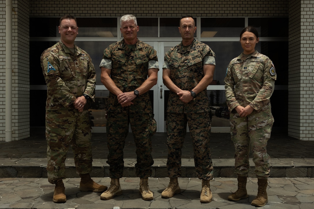 Pearce and Garcia-Park received challenge coins for their efforts during training with III MEF. The Guardians provided subject-matter expertise directly supporting III MEF training.  (U.S. Marine Corps photo by Lance Cpl. Alexander Canal)