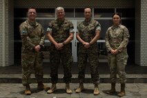 Pearce and Garcia-Park received challenge coins for their efforts during training with III MEF. The Guardians provided subject-matter expertise directly supporting III MEF training.  (U.S. Marine Corps photo by Lance Cpl. Alexander Canal)