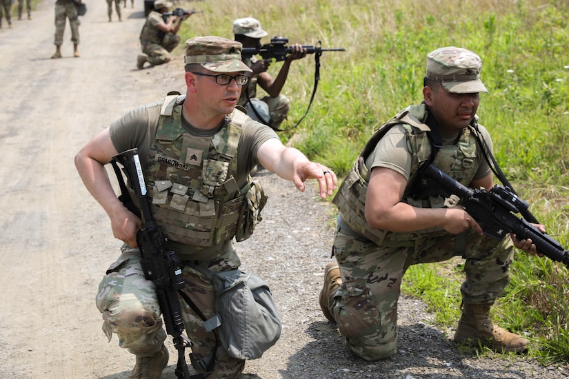 Soldiers with the D.C. National Guard's 104th Maintenance Company conduct squad movement drills at Fort Indiantown Gap, Pennsylvania, on June 3, 2025. The training reinforced basic soldiering skills as part of the unit’s annual training. (U.S. Army photo by Spc. Carrol Hughes)