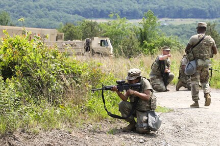 Soldiers with the D.C. National Guard's 104th Maintenance Company conduct squad movement drills at Fort Indiantown Gap, Pennsylvania, on June 3, 2025. The training reinforced basic soldiering skills as part of the unit’s annual training. (U.S. Army photo by Spc. Carrol Hughes)