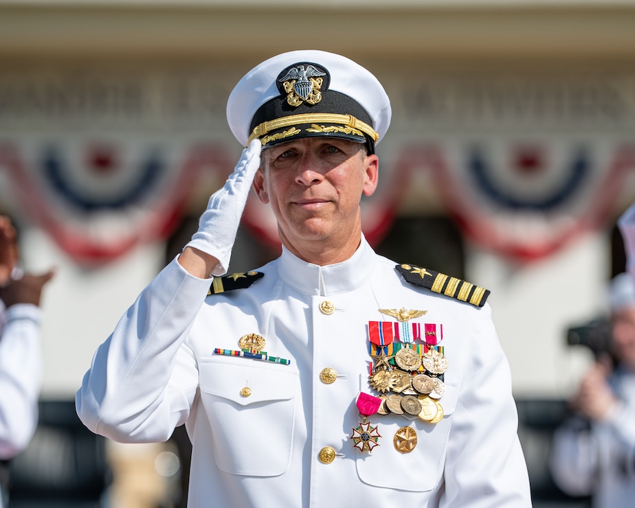 Naval Station Rota leadership salutes and conducts honors for Change of Command.