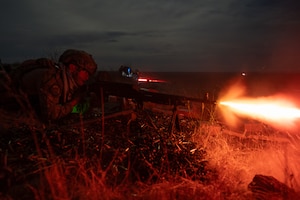 Airman firing gun