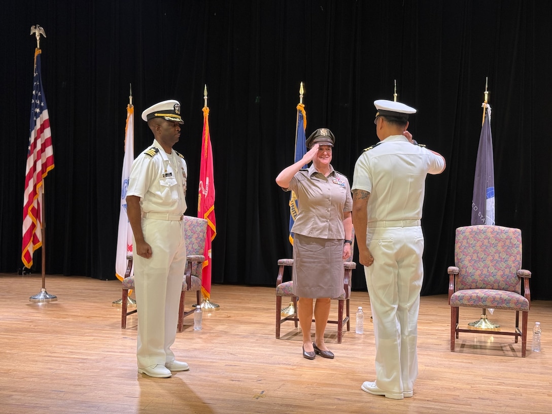 Naval Officers at a change of command at DLA Distribution Bahrain, Southwest Asia.