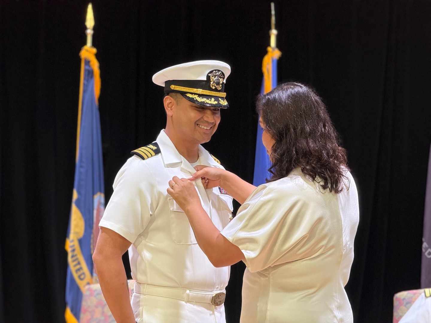 Naval Officers at a change of command at DLA Distribution Bahrain, Southwest Asia.