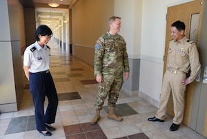 HANSCOM AIR FORCE BASE, Mass., (June 3, 2025) – Maj. Gen. Luke Cropsey, center, meets with Japan Maritime Self Defense Force Capt. Daigo Tsubokura, right, and Japan Air Self Defense Force Maj. Yuka Akiyama, left, during a visit, here, June 3, 2025. Delegates from the Japanese Joint Staff met with Airmen to learn more about the Department of the Air Force’s Program Executive Office for Command, Control, Communications and Battle Management’s DAF BATTLE NETWORK. Cropsey is C3BM’s program executive officer. (Official Air Force Photo by Richard Blumenstein)