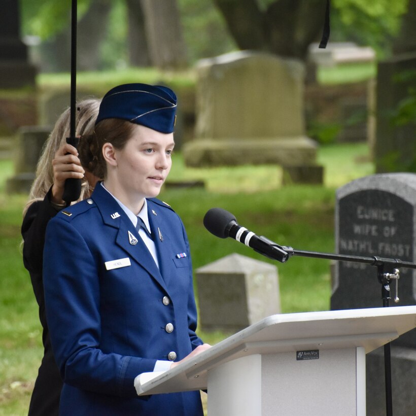 Lt. Hendl delivering remarks at a podium