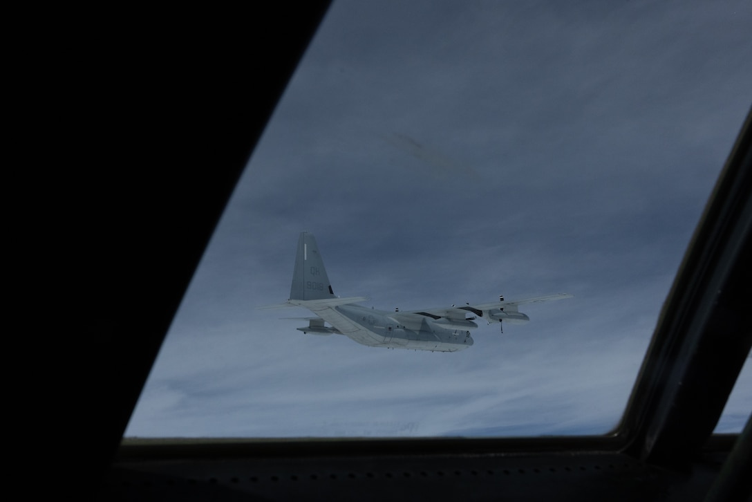 A U.S. Marine Corps KC-130J Super Hercules assigned to Marine Aerial Refueler Transport Squadron (VMGR) 234, Marine Aircraft Group 41, 4th Marine Aircraft Wing, flies in formation during Exercise Sentry North in Wisconsin, June 4, 2025.