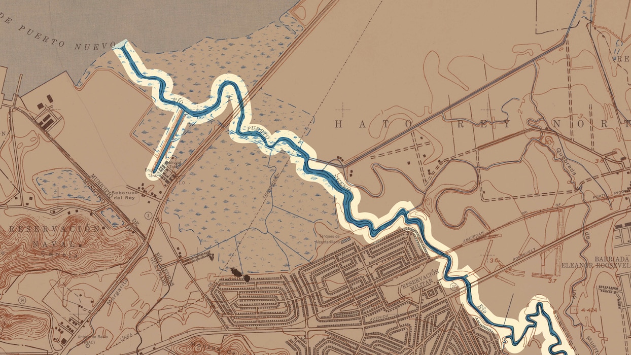 Historic map of San Juan, Puerto Rico, dated 1950, showing the loss of mangroves near San Juan Bay and the development of some homes and businesses in the area.