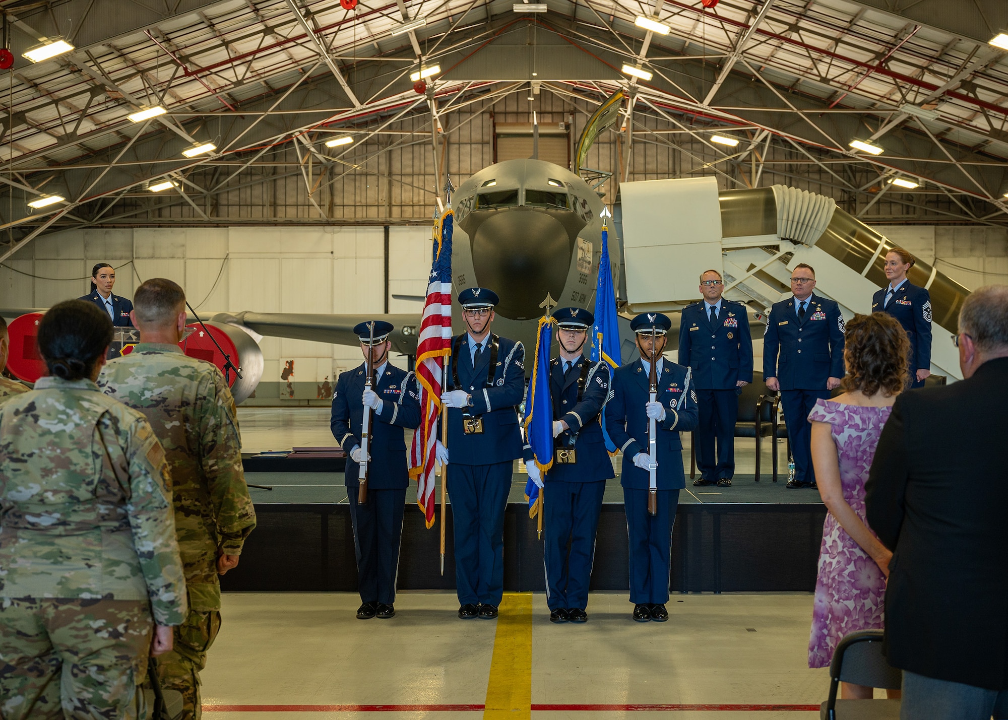 honor guard holds flags
