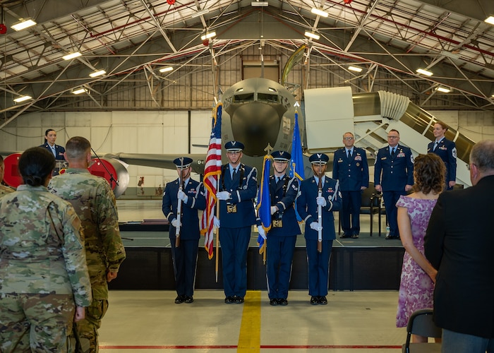 honor guard holds flags