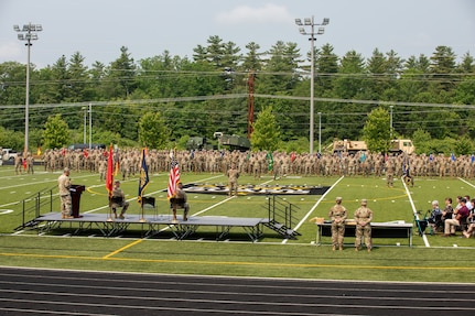 Soldiers and airmen with the New Hampshire National Guard stand in formation during a change of responsibility and retirement ceremony June 8, 2025, at the Edward Cross Training Complex in Pembroke, N.H.