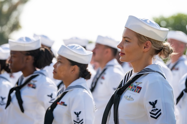 NAVAL STATION ROTA, Spain (June 12, 2025) Aviation Boatswain's Mate (Equipment) 2nd Class Krystin Hanner, from Charlotte, N.C., assigned to Naval Station (NAVSTA) Rota's Air Operations department, stands in formation during the NAVSTA Rota change of command ceremony, June 12, 2025. As the "Gateway to the Mediterranean,” NAVSTA Rota provides U.S, NATO and allied forces a strategic hub for operations in Europe, Africa and the Middle East. NAVSTA Rota is a force multiplier, capable of promptly deploying and supporting combat-ready forces through land, air and sea, enabling warfighters and their families, sustaining the fleet and fostering the U.S. and Spanish partnership. (U.S. Navy photo by Mass Communication Specialist 1st Class Drace Wilson)